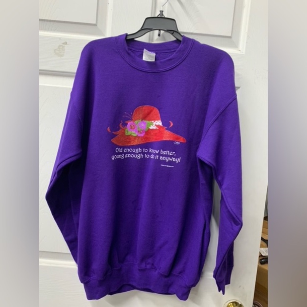 M or XL purple sweatshirt red hat old enough to know better, young enough